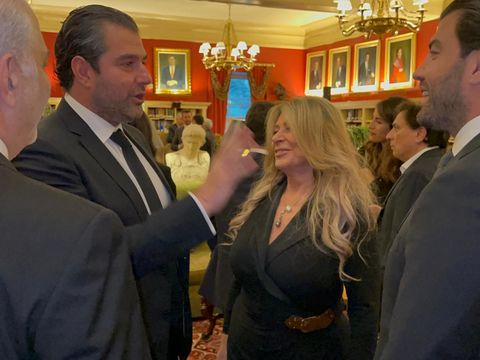 Guests in conversation at a reception